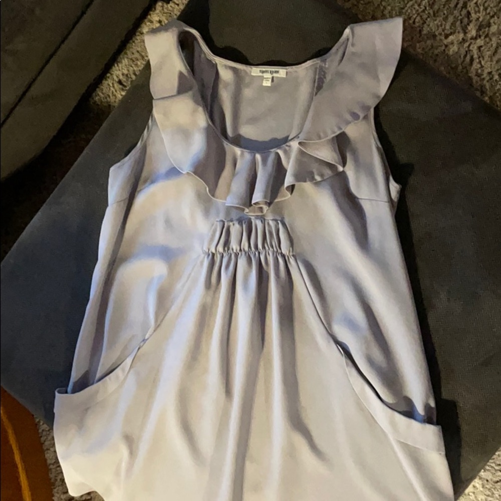 Sleeveless ruffled blouse